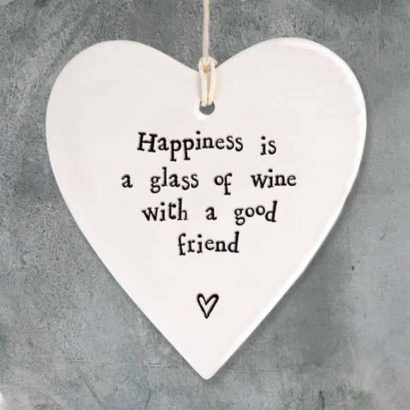 Happiness is a glass of wine with a good friend  East of India round heart