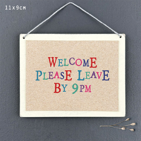 Welcome please leave by 9pm wooden sign by East of India